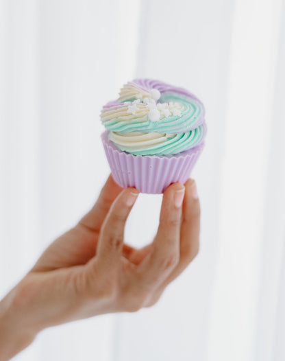custom cupcake in hand